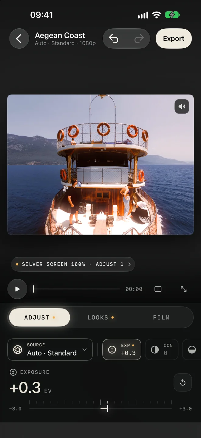 LUTLINE editor on iPhone: a boat on the Aegean Sea graded with the Silver Screen look, the Adjust tab open with exposure at +0.3 EV